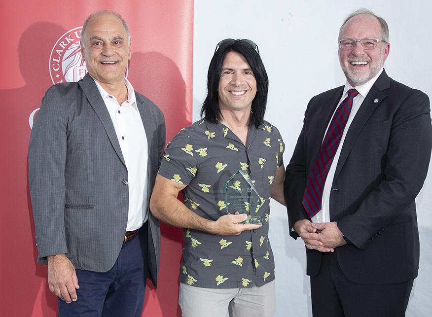 Jonas Gilman Clark Award winner Dean Cascione, M.S. ’17, center, with Richard Aroian, executive director of corporate outreach and assistant dean for STEM programming (left), and John LaBrie, associate provost and dean of the School of Professional Studies.