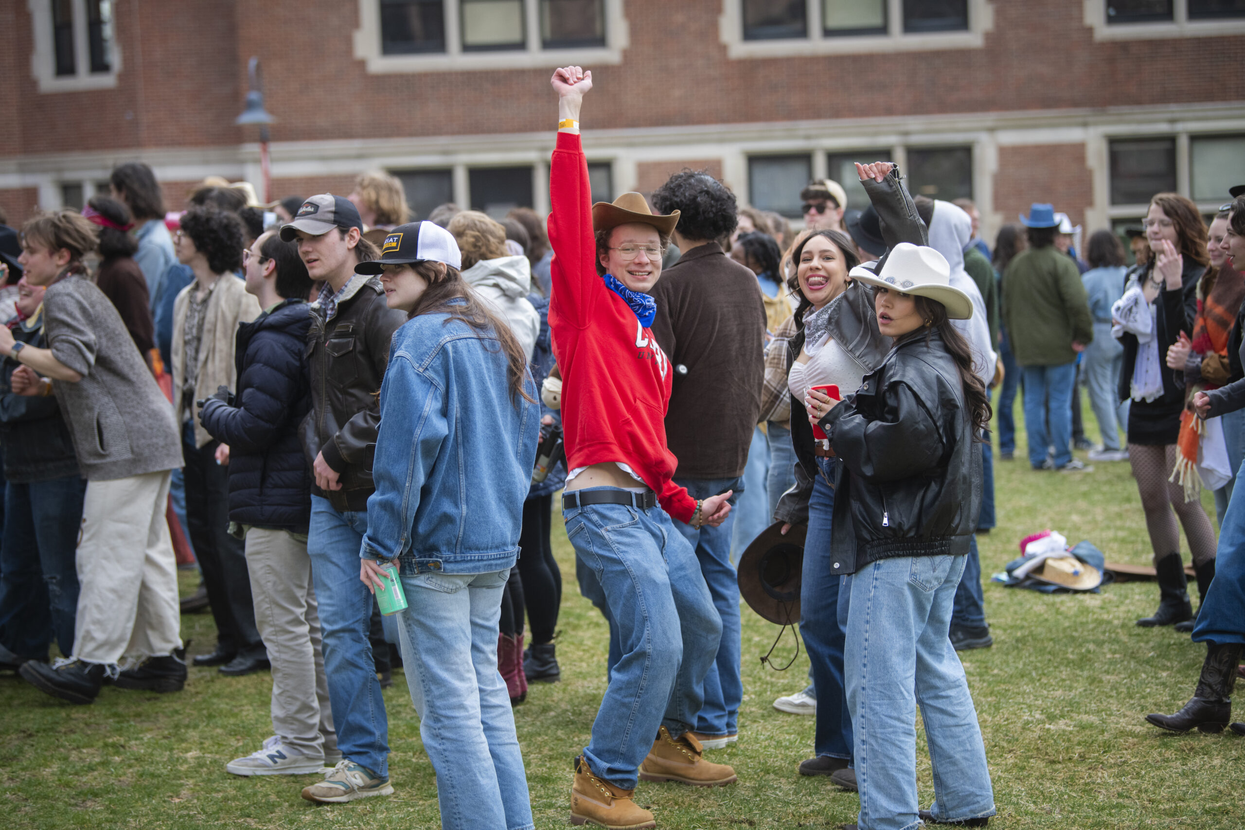 students celebrate on campus green