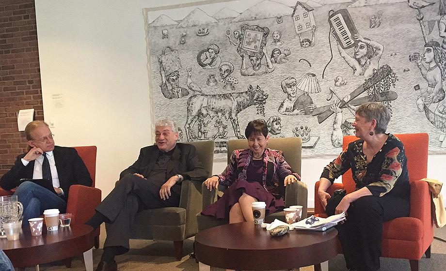 Thomas Kühne,David Pijawka, Judy Dworkin and Jody Emel, seated in chairs, talk about issues in "Indian country."