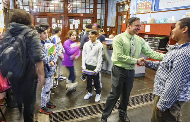 University Park School president shaking hands
