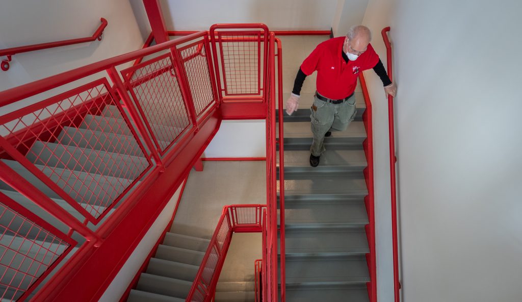 stairs with facilities employee