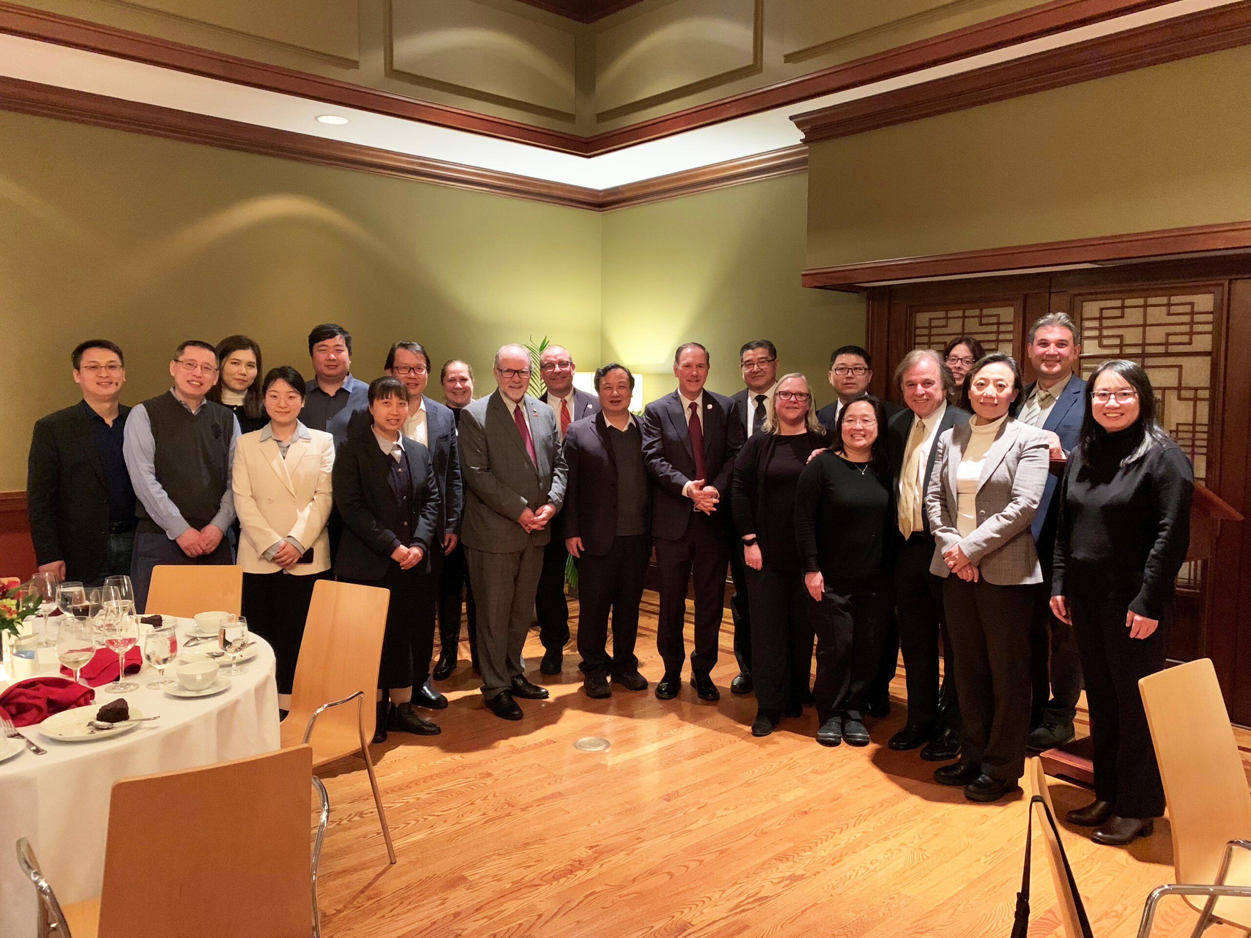 HFUT visitors at a dinner with The Clark U President