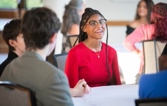 photo of student at a dinner table