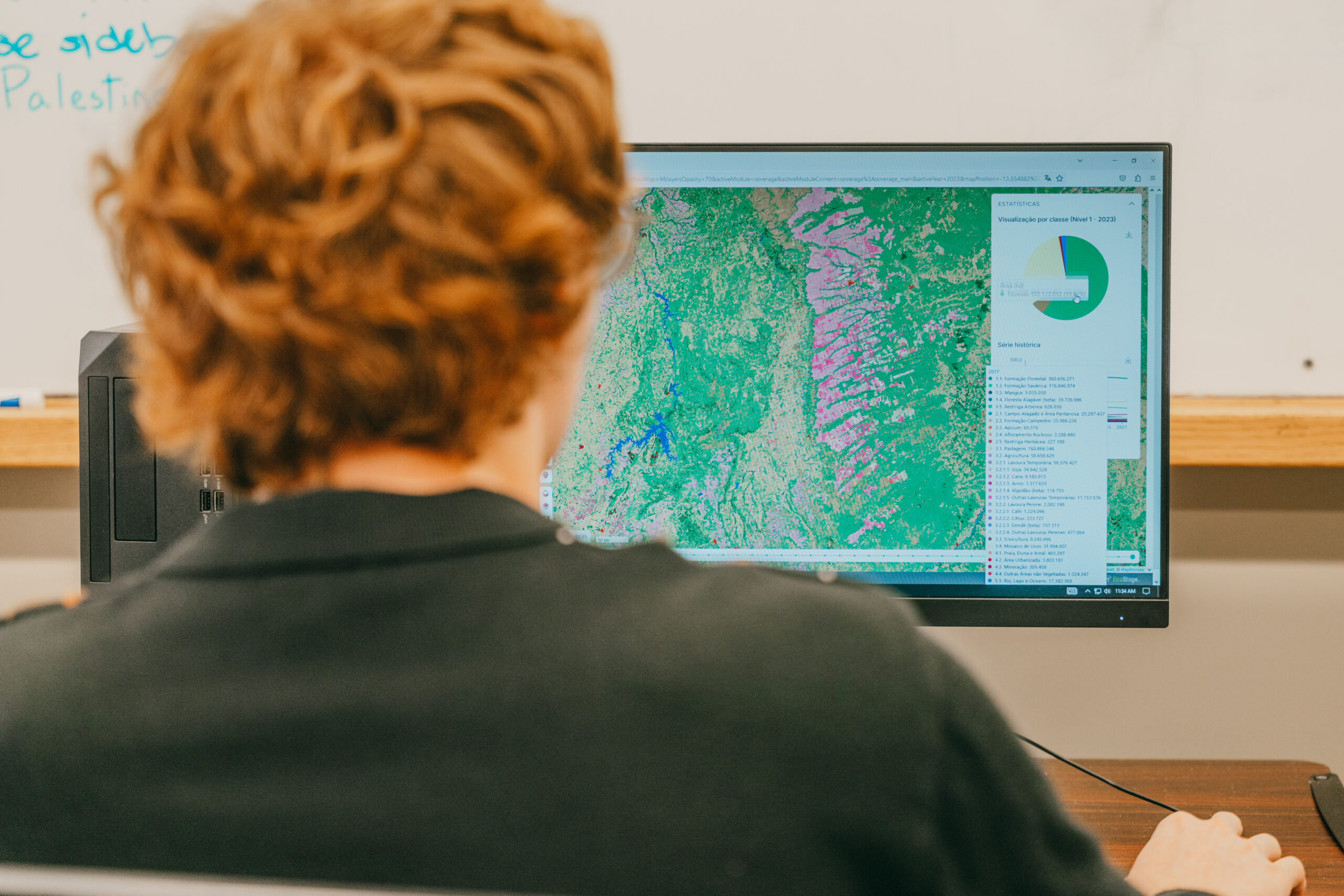 a student works with GIS data