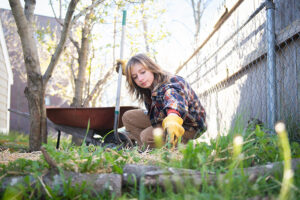 Clark student focused on sustainability volunteers at a local community food collaborative