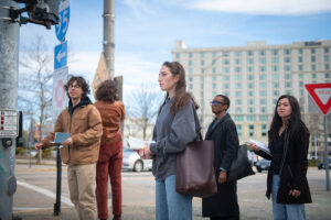 Clark students tour a local city and make notes for an Urban Ethnography-Lab