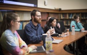 Student participate in a round table discussion