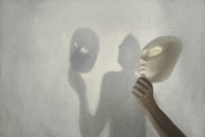 silhouette of man holding up face mask