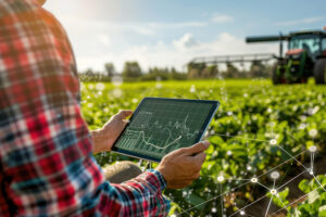 applied data analytics - person holding tablet on farm
