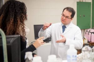 Faculty and student in a chemistry lab