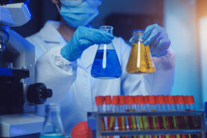chemistry and biology medicine - women in chemical lab