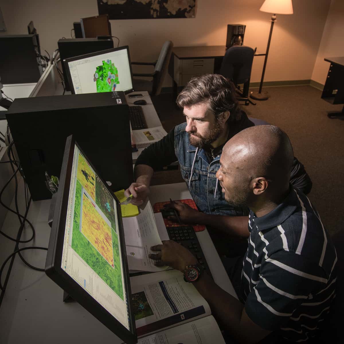 Students looking at a map
