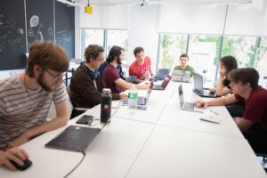 Students work on teams in their Game Studio class.
