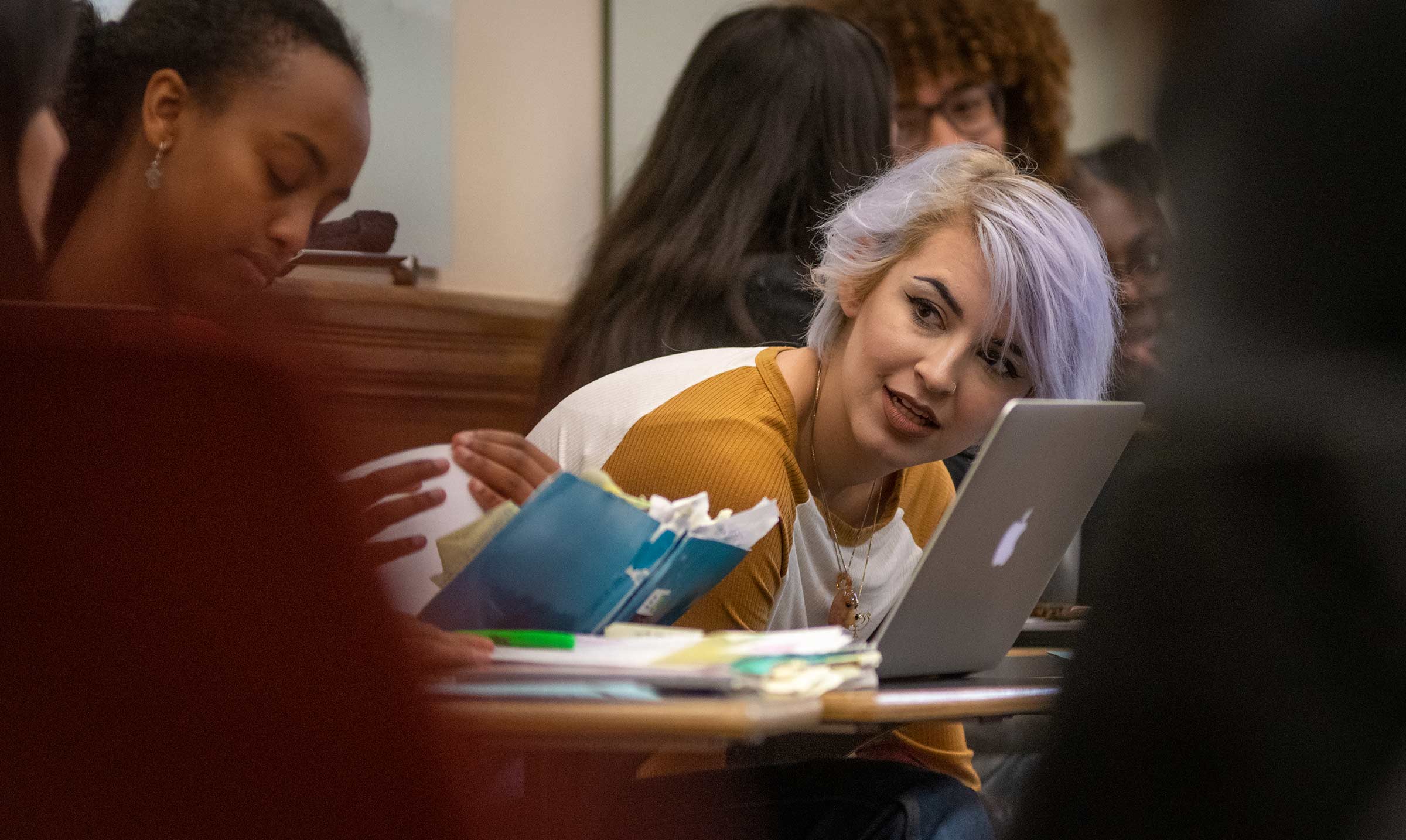 Students interact during a sociology class on status and power