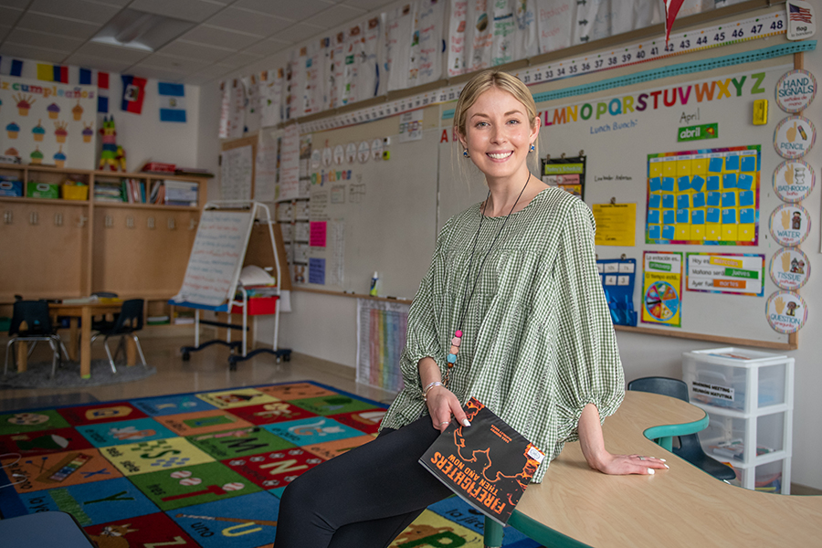 teacher at desk