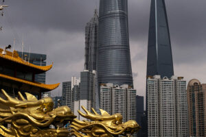 Traditional dragon motif in front of modern skyscrapers in a growing Shanghai skyline