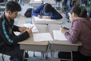 urban schooling - children working at desks