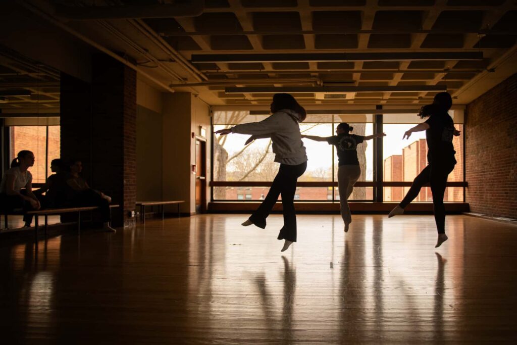 students rehearse in the dance studio