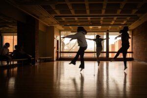 students rehearse in the dance studio