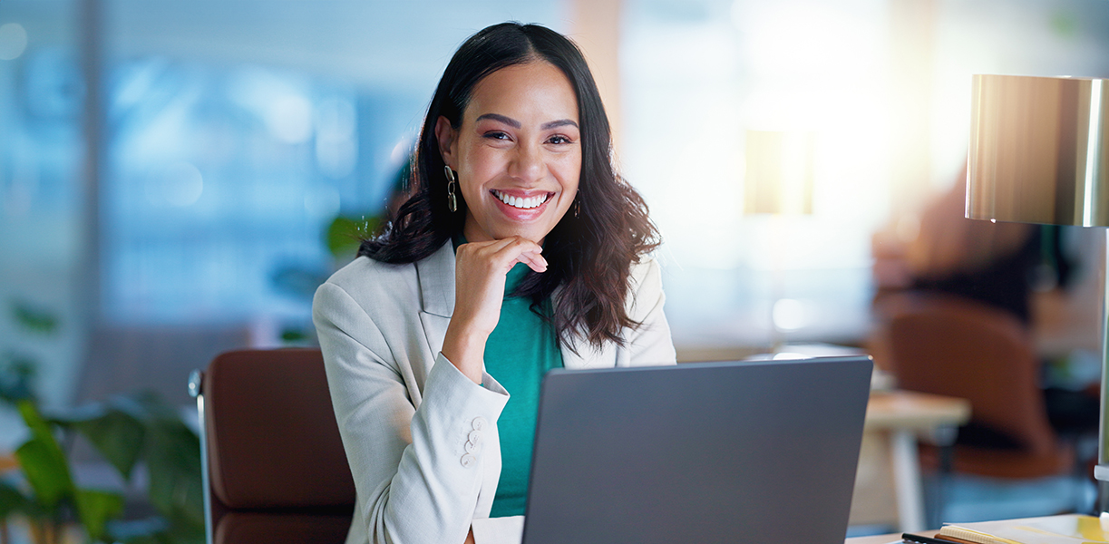 Portrait, smile and businesswoman with laptop, confidence and consulting business for online research agency. Planning, networking and happy woman with computer, financial administration and office.