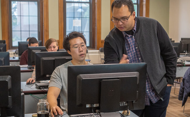 Professor and student in statistics lab