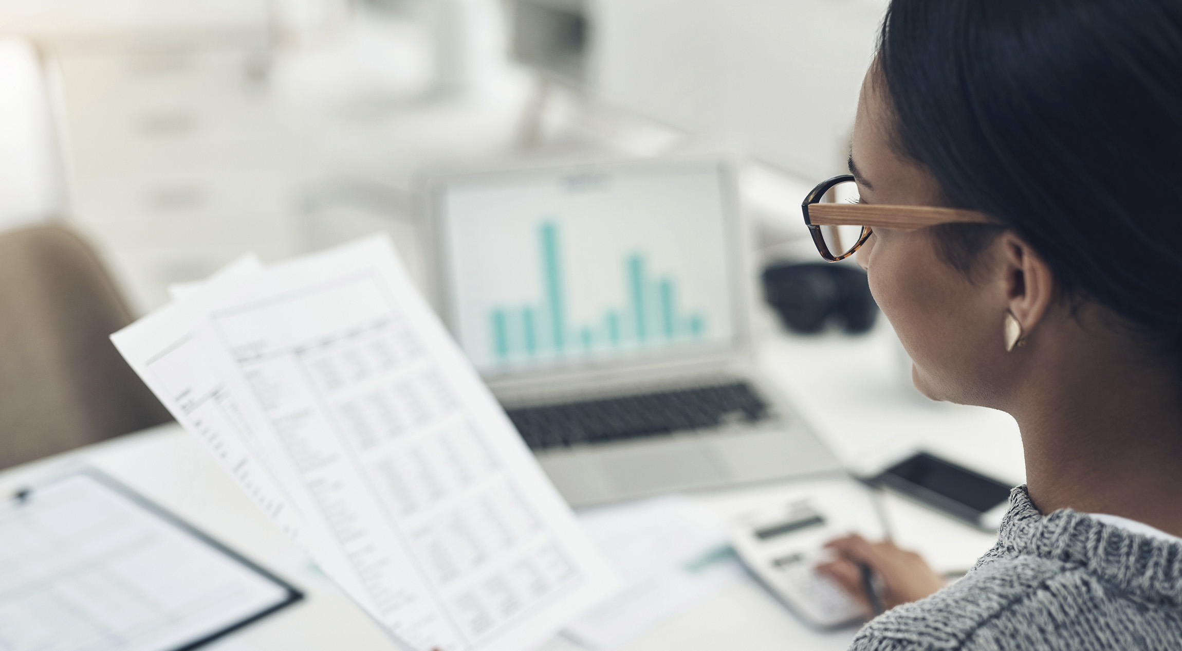 girl looking over analytics