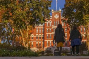 students approach Jonas Clark Hall