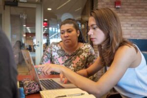 student and advisor working together