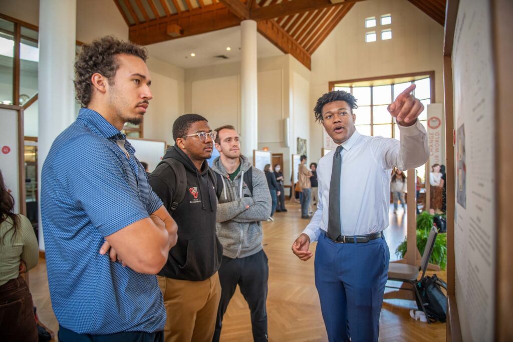 a student presents research during ClarkFest