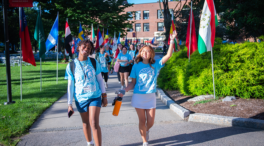 Group of students walking through campus on move-in day