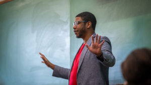 Justin Shaw teaching a British Literature class